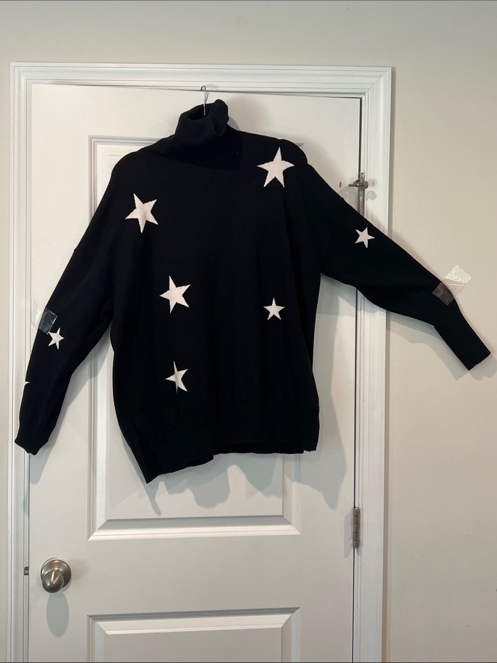 Women’s Black Star Turtleneck Sweater